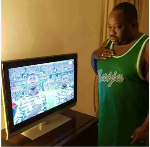 Dele Momodu Observing National Anthem Infront Of His TV During Nigeria Match